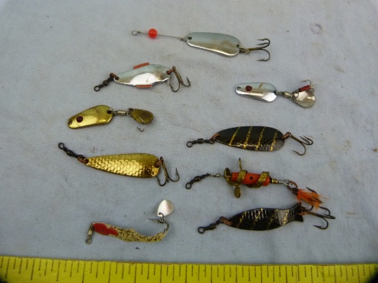 9 Spoon-type fishing lures, various conditions