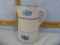 White pottery pitcher with blue bands & design, 8-3/4