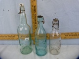 3 Glass bottles with lids & wire bails