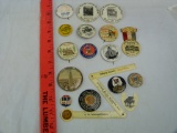17 Advertising items, mostly pins
