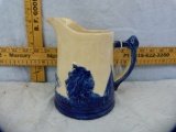 Old Sleepy Eye blue & white pitcher, Western Stoneware