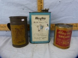 3 Tins: Maytag - one qt Multi-Motor oil, 1 pound Wringer Grease, fuel mixing cup with applied label