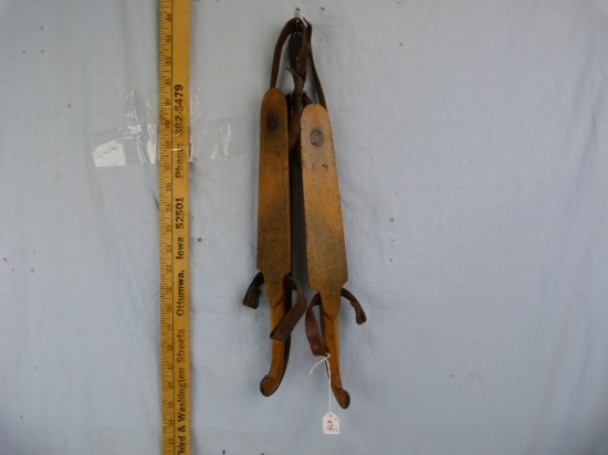 Pair of Dudeshoo(?) ice skates, wood base w/leather straps