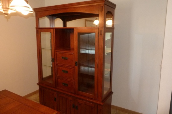 China hutch with 2 glass doors, mirrors inside and top, 3 drawers and 3 doors