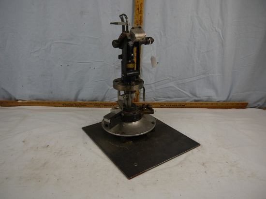 Star Machine Works reloader (incomplete) attached to 1/4" thick metal base