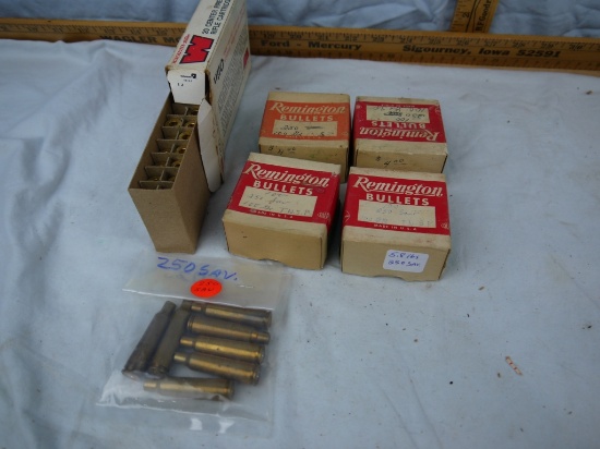 5. pounds .250 Savage bullets  & a few brass casings (includes weight of boxes)