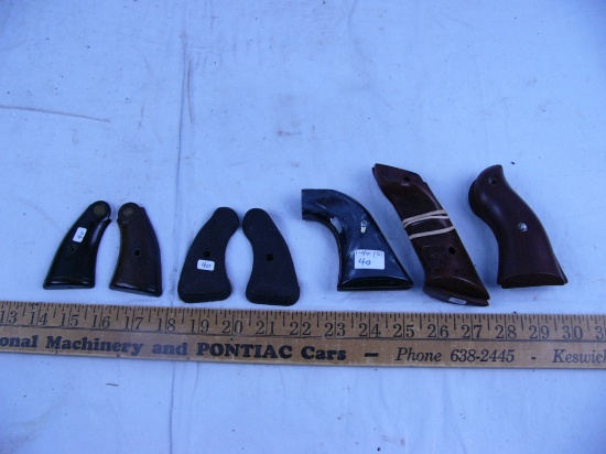 (5) pistol grips: Colt, Smith & Wesson, glossy black probably Colt, & 2 others - AOM