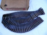 Ammo:  machine gun belt with blanks & fired casings, 68