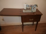 Rotary sewing machine with cabinet - zigzag & buttonholer