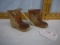 Pair of What Cheer pottery boots, 2-1/4