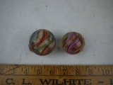 (2) large swirl marbles with chips, 1-1/2