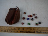 Leather pouch with 12 mixed marbles, string cord for drawstring