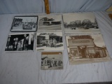 (7) black & white photos of gas stations, general stores, and auto hauler