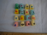 (16) plastic thimbles with oil company advertising