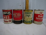 (4) full one quart oil cans