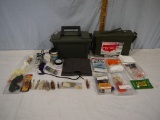 (2) ammo cans - 1 plastic & 1 metal, both full of cleaning supplies