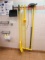 LOT OF MISC. BROOMS, SQUEEGEES, AND RACK
