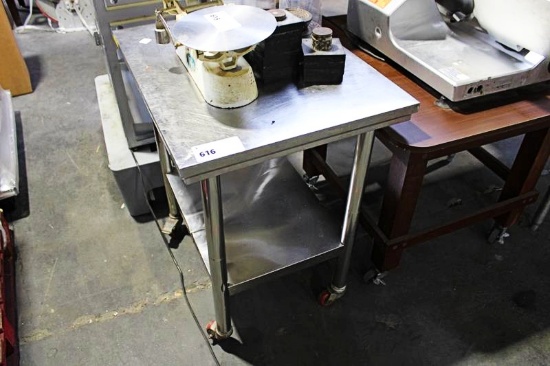30X24 STAINLESS STEEL TABLE ON CASTERS
