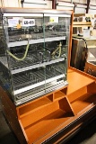 DRY BAKERY CABINET ON WOOD SHELF DISPLAY