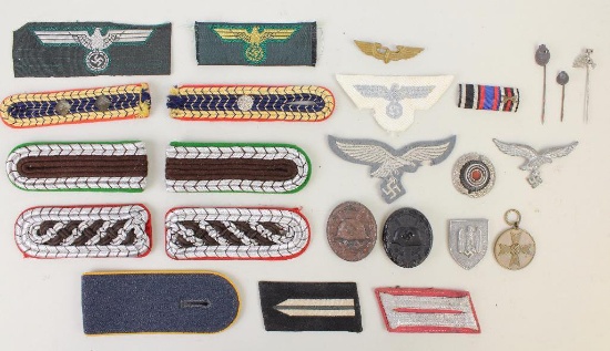 Grouping of German WWII Insignia and Other Materials