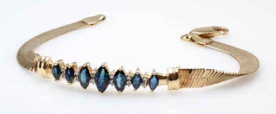 BRACELET. BLUE SAPPHIRE AND DIAMOND. 14K YELLOW GOLD