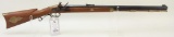 Thompson Center Arms Hawken style flintlock rifle.