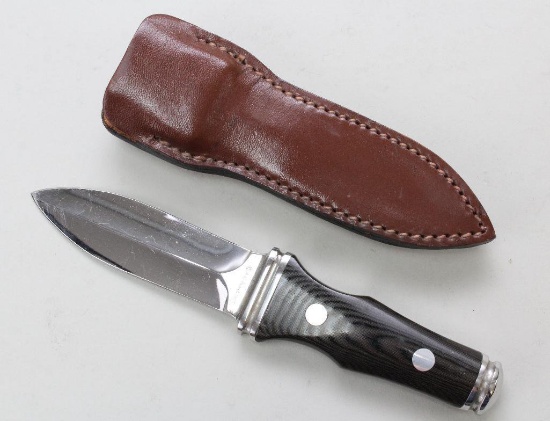 A. G. Russell double edge boot knife.