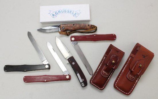 A.G. Russell knife and sheath lot .