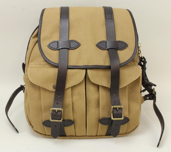 1 new Filson Backpack.