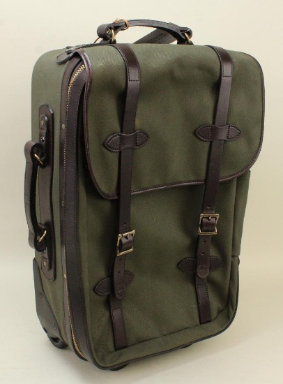 1 new Filson medium rolling carry-on bag.