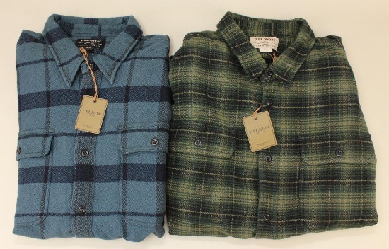 2 new Filson long sleeve fintage flannel work shirts.