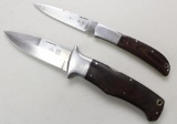 2 Al-Mar folding knives.