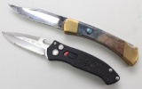 2 Buck push button auto knives.