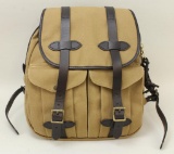1 new Filson Backpack.