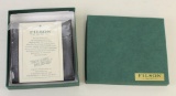 1 new Filson leather Packer wallet.