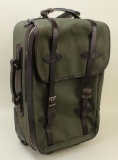 1 new Filson medium rolling carry-on bag.