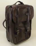 1 new Filson weatherproof mediuim rolling carry-on bag.