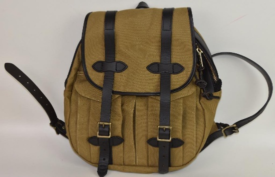 1 New Filson Rucksack.