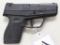 Taurus PT709 semi-automatic pistol.
