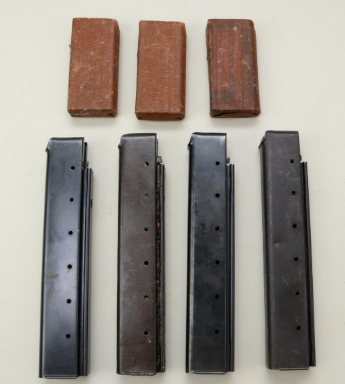 4 - 30 round Thompson stick magazines and 3 - 15 round M1 Carbine magazines.