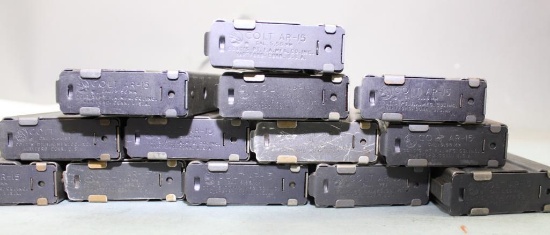 Lot of 13 Colt AR-15 20 round magazines.