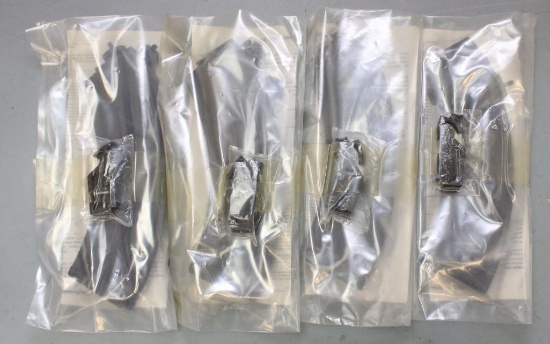 Lot of 4 - 30 round detachable SKS magazines.