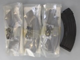 Lot of 4 - 30 round detachable SKS magazines.