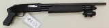 Mossberg 500C pump action shotgun.