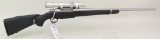 Raptor bolt action rifle.