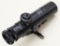Colt 3 x 20 scope with clear optics and leather caps.
