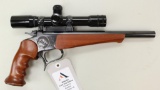 Thompson Center Contender single shot pistol.