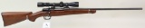 Unknown maker sporterized bolt action rifle.