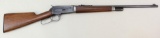 Winchester Model 1886 takedown lever action rifle.