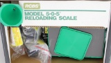 RCBS reloading scale and accessories.